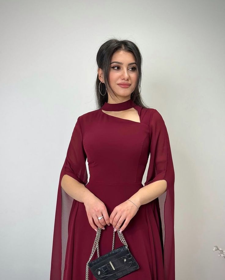 “Hayrah Signature Statement Sleeves Gown”