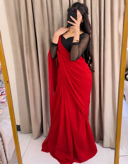 Scarlet Muse – Red Saree with Black Sheer-Sleeve Blouse