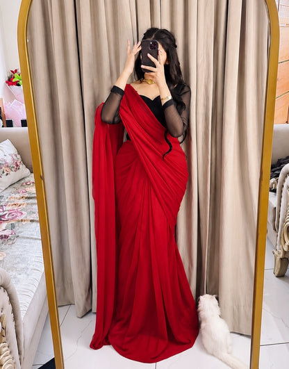 Scarlet Muse – Red Saree with Black Sheer-Sleeve Blouse