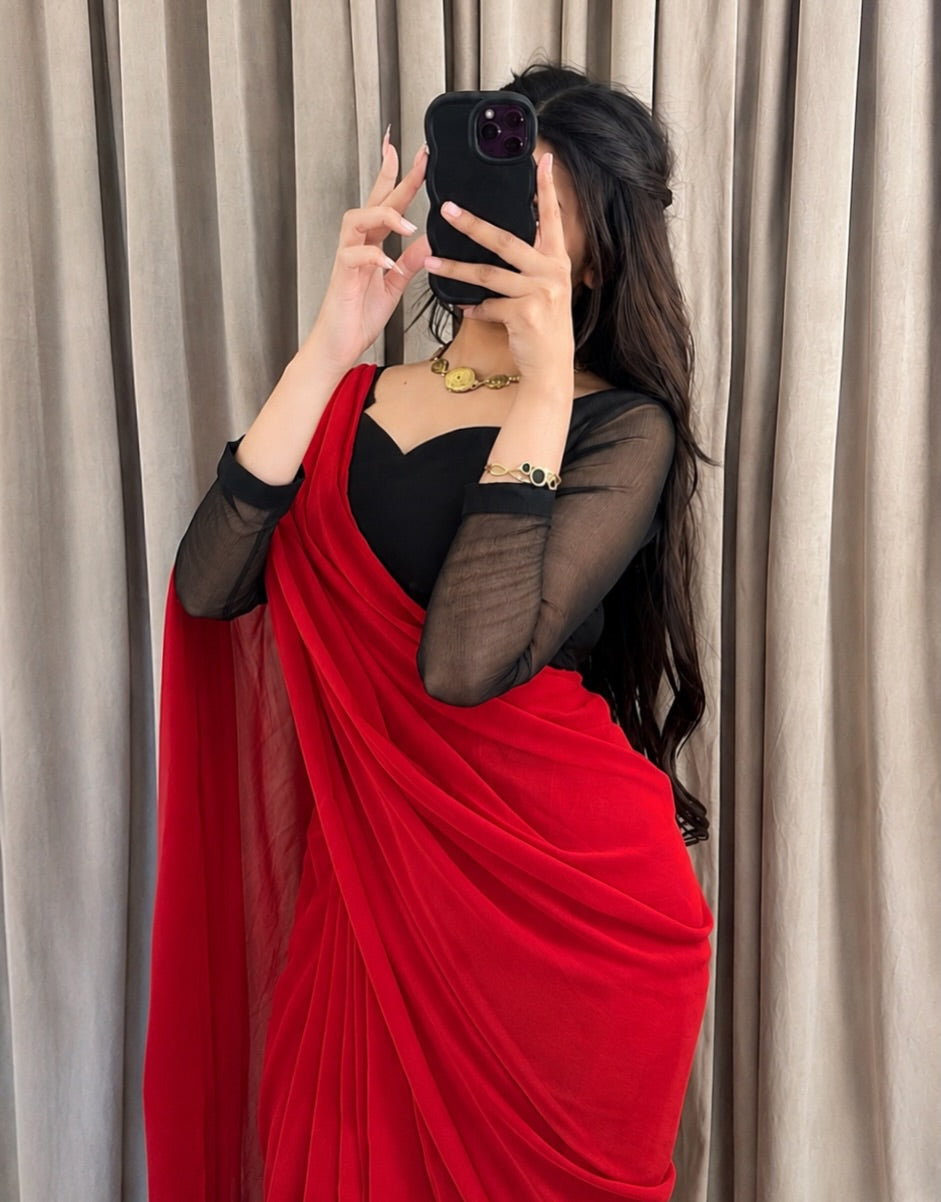 Scarlet Muse – Red Saree with Black Sheer-Sleeve Blouse